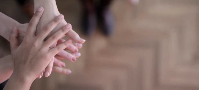 people holding hands