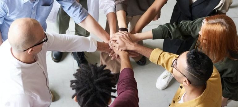 people holding hands