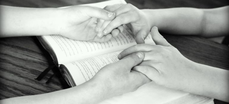 People holding hands. 