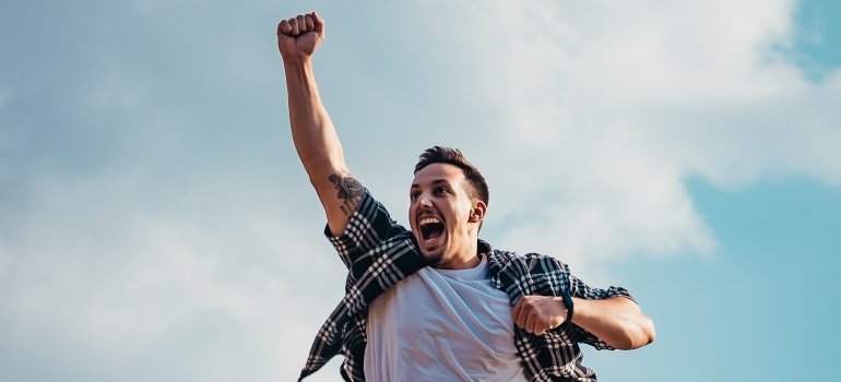 person being happy after attending a sober living Pennsylvania program
