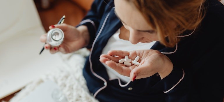 Woman taking too many pills due to drug addiction In Pennsylvania