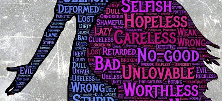 Silhouettes of a person and a child filled with words that describe BPD.