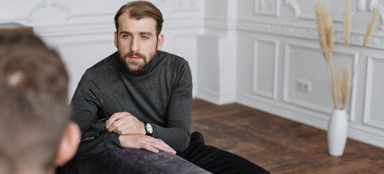 a man thinking about preparing for a loved one's return from PA rehab