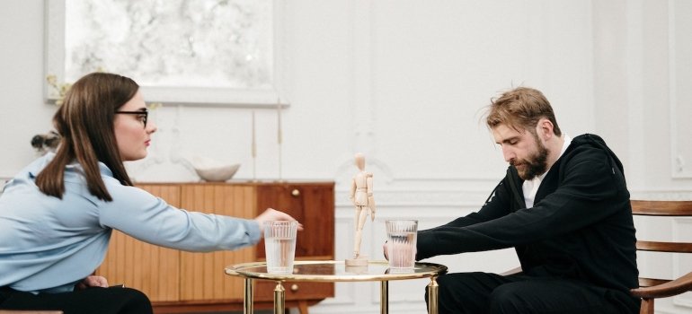 a woman scolding her friend