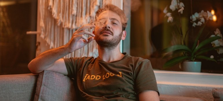 a man smoking a joint