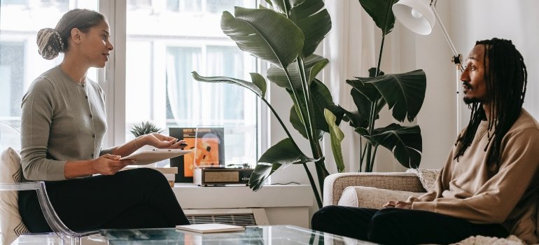 focused black man listening to his therapist, representing detox center pennsylvania