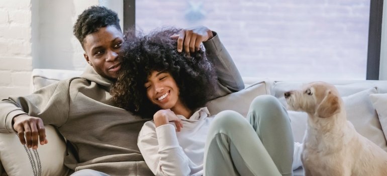 boyfriend and girlfriend sitting on the couch