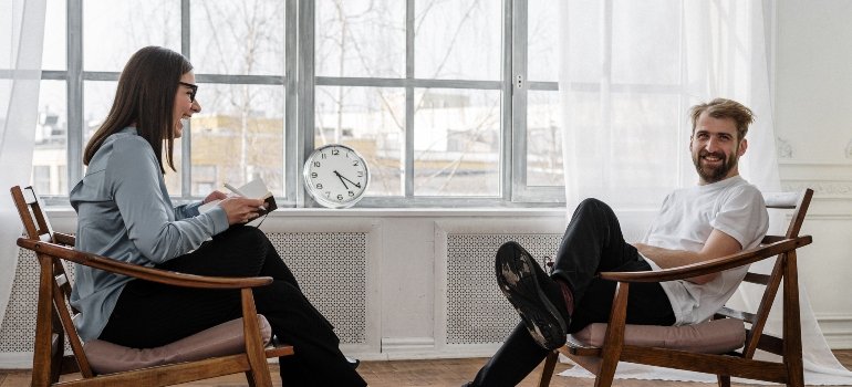 two people in a therapy session