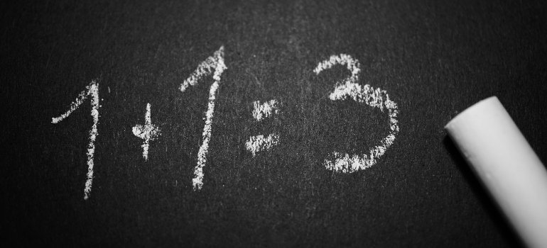 1+1 = 3 on a blackboard