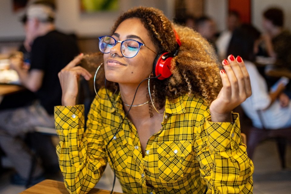 person listening to music