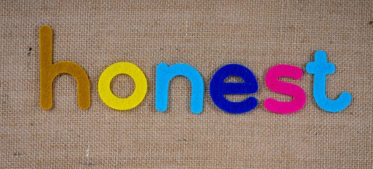 the word "honest" spelled by colored thread