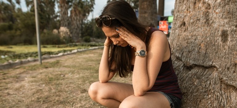 person thinking about self-harm and addiction