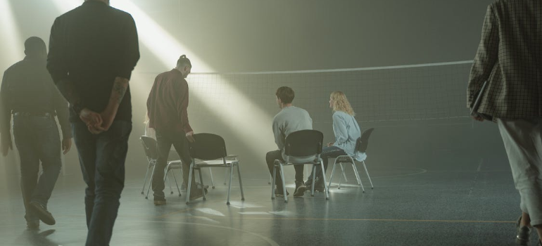 A group of people starting a psychotherapy session indoors representing IOP pennsylvania