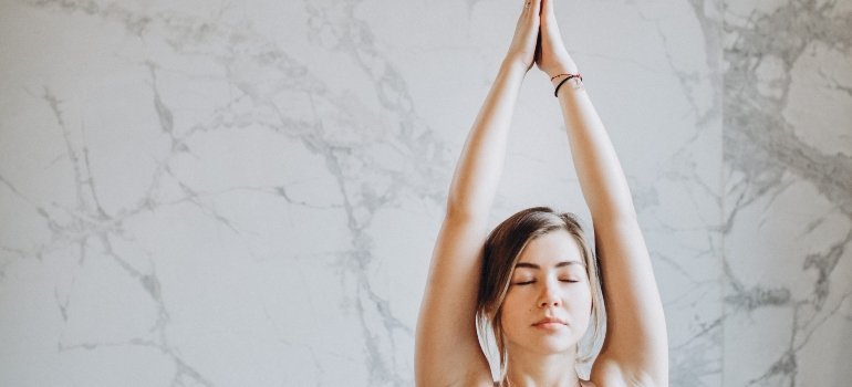 person holding their arms up