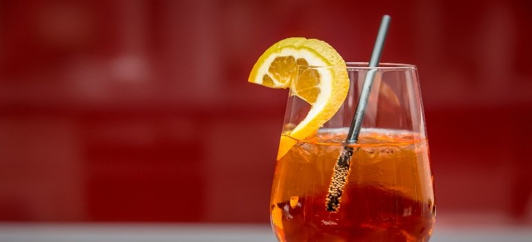 a glass of alcoholic beverage