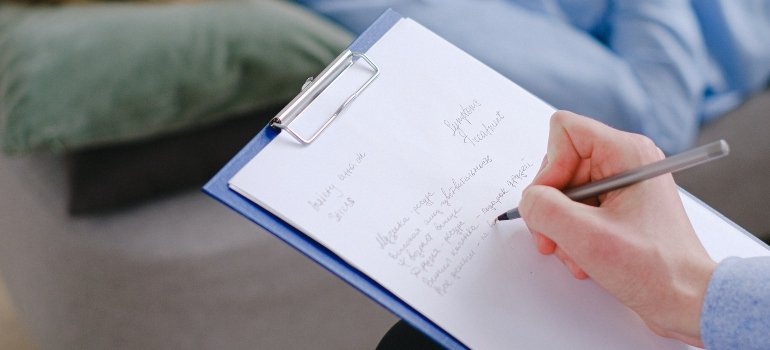 person noting down the common co-occurring disorders in dual diagnosis