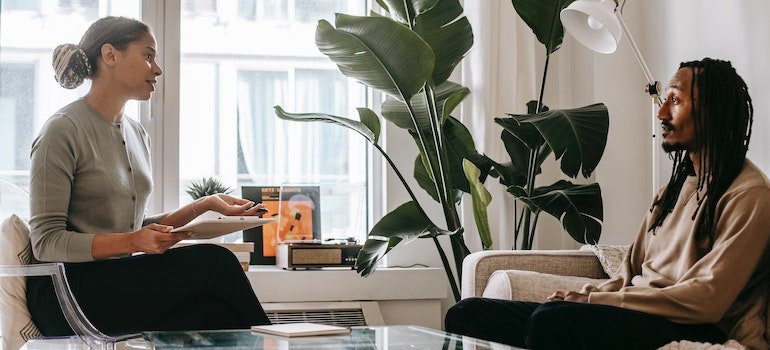 a patient asking a therapist, “Does CBD play a role in addiction recovery?”