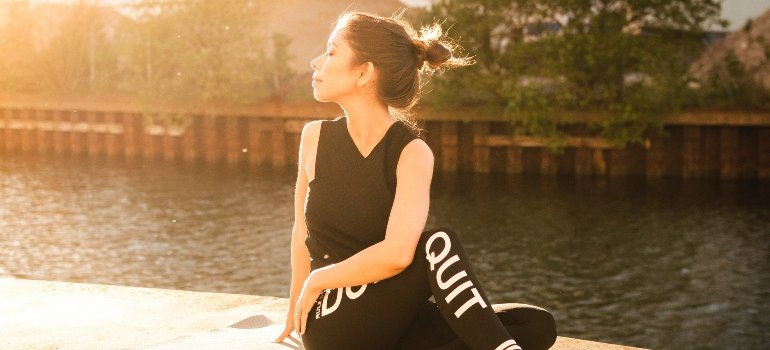 Woman practicing yoga outside