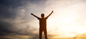 A happy individual after Little Creek recovery program emphasizing the Difference Between an Intensive Outpatient Program and a Partial Hospitalization Program