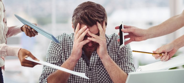 Stressed man frustrated with his surroundings