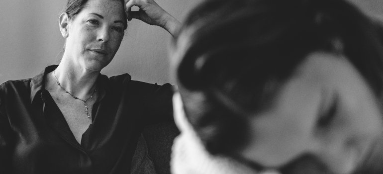 Two distressed females in black and white