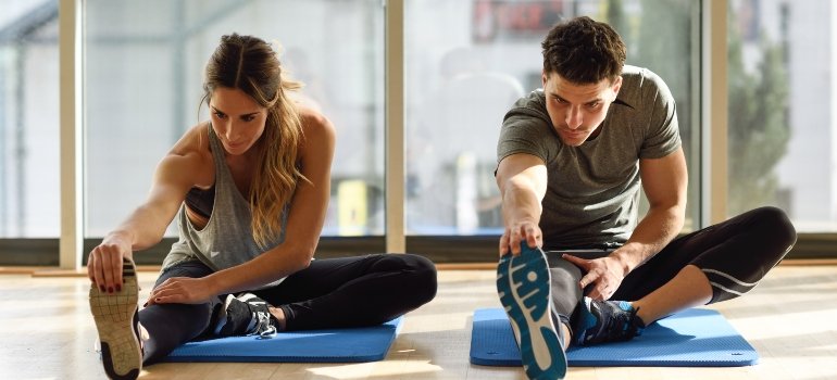 Two people indulging in a physical activity, strengthening their resolve to stay sober.