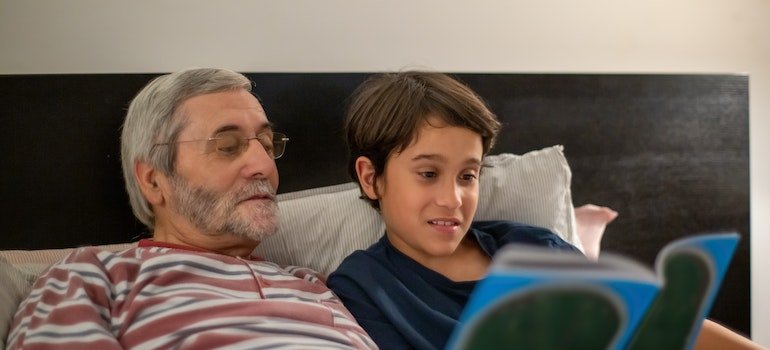 a grandpa telling a story to his grandson