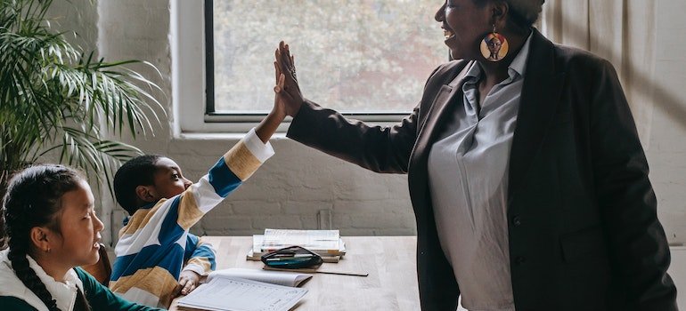 Teacher with two students.