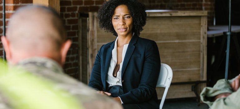 a person looking at a soldier