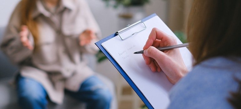 One of the questions you shouldn't ask a recovering PA addict is definitely: "Do you miss the highs?" Woman interviewing addict.