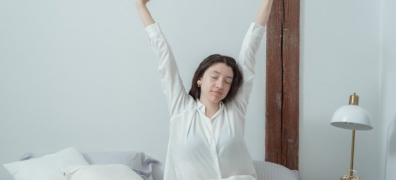 Girl in her first year of sobriety in Pennsylvania, having an routine of waking up early.