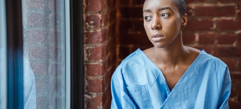 woman looking out of the window