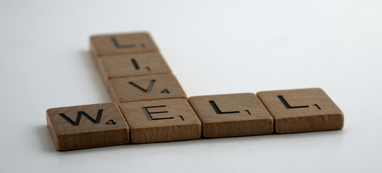 Live well written with brown wooden blocks