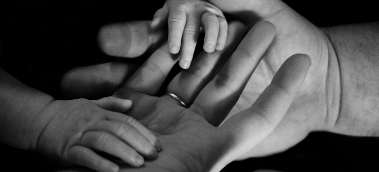 hands of all the family members 