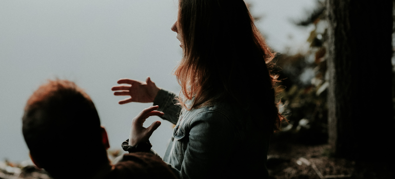 a woman talking to a man about her problems 