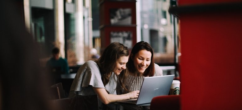 Two colleagues smiling. 
