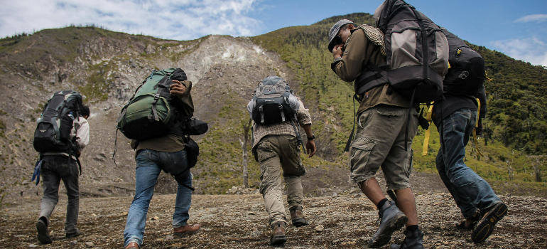 five men going hiking