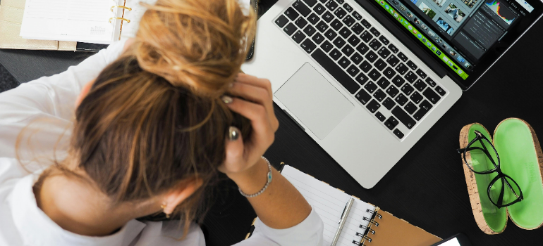 a woman having a hard time at work