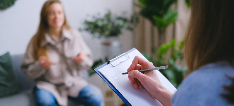 a psychologist taking notes