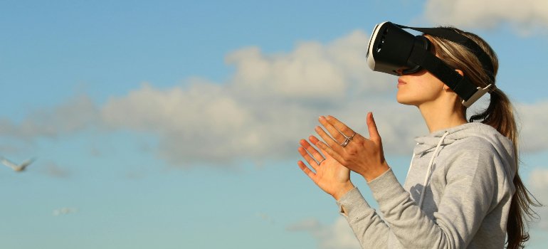 A woman contemplating virtual reality therapy in addiction treatment in PA.