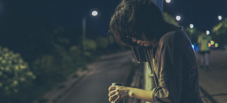 a girl drunk realizing why drinking games are a concern for Pennsylvania's college students