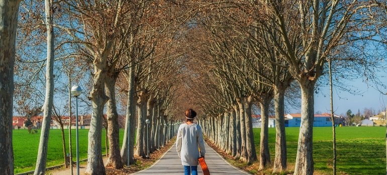 Happy person walking outdoors.