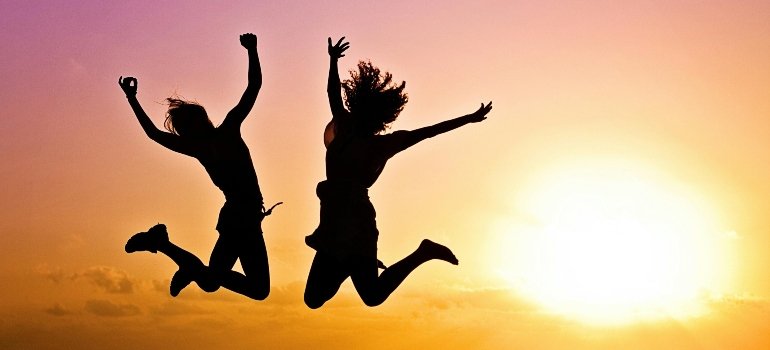 Happy people jumping.