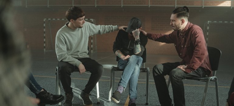 People talking in group therapy about non-substance-related addictions in PA