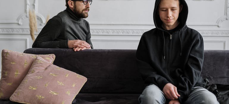 a teen and a therapist talking about residential treatment for teens