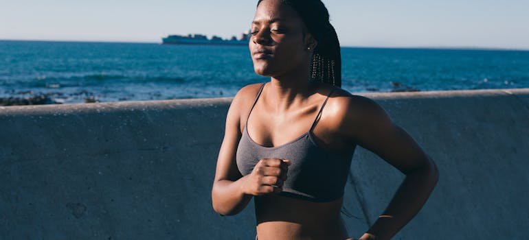 woman running to alleviate the symptoms of addiction.