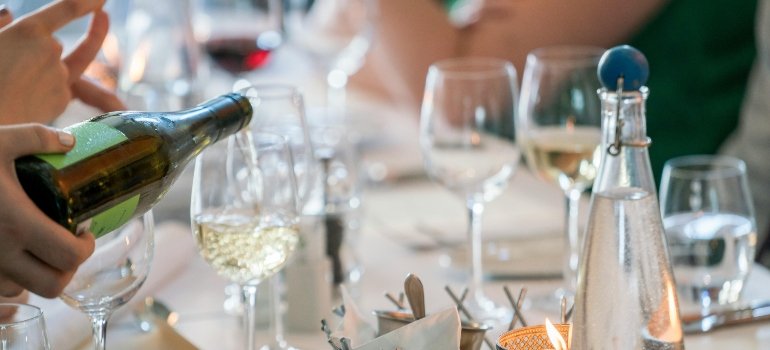 a person pouring wine 