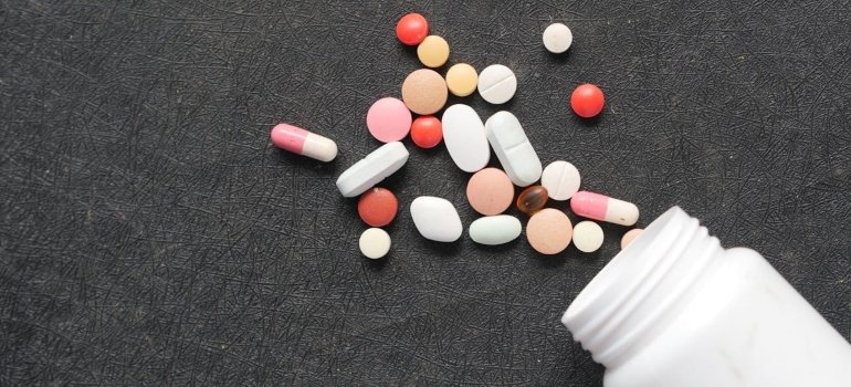 a lot of pills coming from the bottle 