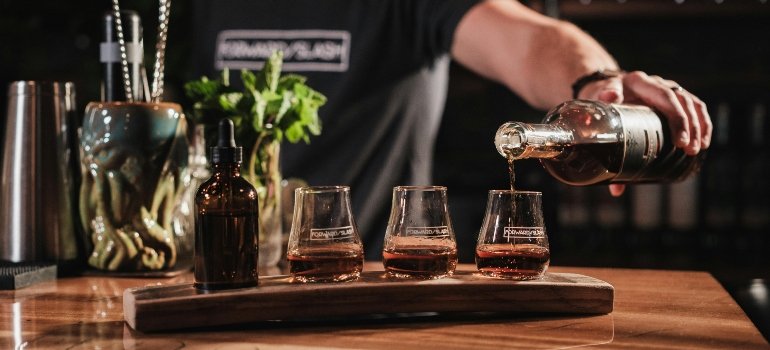 a man pouring drinks amidst the alcohol crisis in Pennsylvania