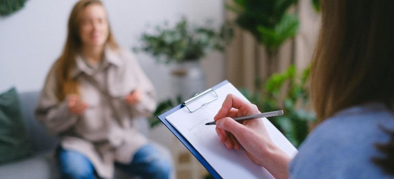 A girl in therapy talking about how Amphetamines Impact Body Temperature